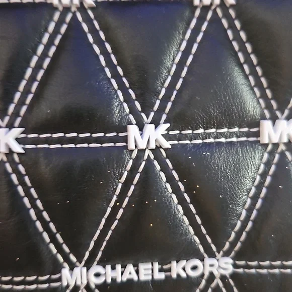 Michael Kors Black and White Quilted Backpack - Picture 8 of 12